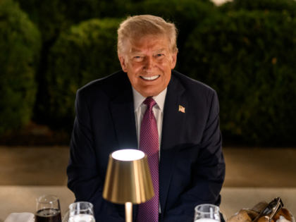 President Donald Trump hosts a dinner in the newly renovated White House Rose Garden, Frid