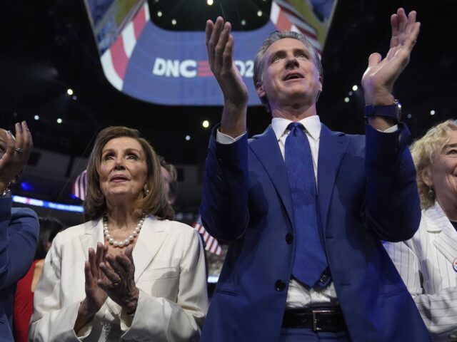 Rep. Nancy Pelosi, D-Calif., and California Gov. Gavin Newsom watch as Democratic presiden