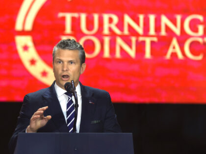 U.S. Secretary of War Pete Hegseth speaks during the memorial service for political activi