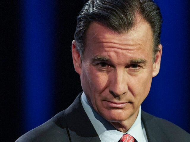 Congressman Tom Suozzi, D-N.Y., listens during New York's governor primary debate at