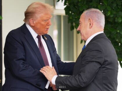 President Donald Trump, left, shakes the hand of Israeli Prime Minister Benjamin Netanyahu