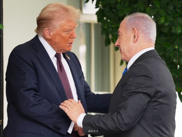 President Donald Trump, left, shakes the hand of Israeli Prime Minister Benjamin Netanyahu