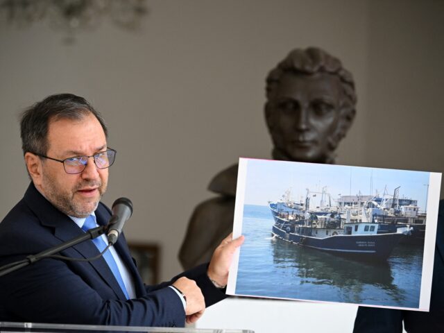 Yván Gil Venezuela's Foreign Minister Yvan Gil shows a picture of a fishing boat during a press con