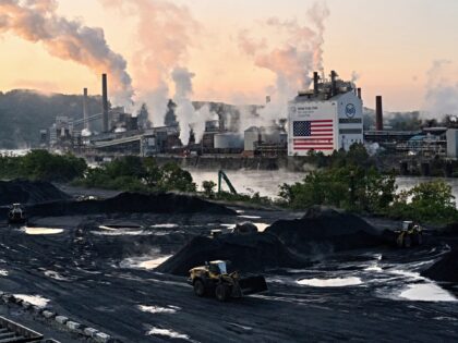 Bulldozers move coal near the United States Steel Corp. Clairton Coke Works facility in Cl