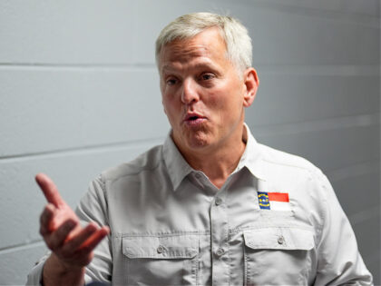 North Carolina Gov. Josh Stein is interviewed at West Henderson High School after meeting