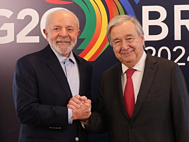 brazil un RIO DE JANEIRO, BRAZIL - NOVEMBER 16: Brazil's President Luiz Inacio Lula da Silva shake h