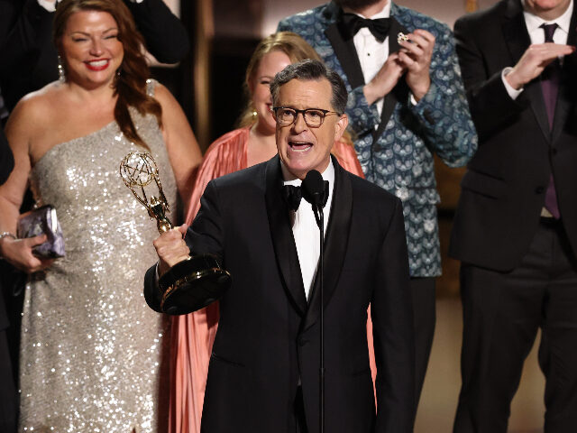 colbertemmy LOS ANGELES, CALIFORNIA - SEPTEMBER 14: Stephen Colbert accepts the Outstanding Talk Serie