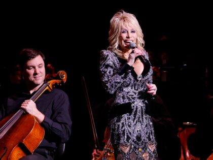 NASHVILLE, TENNESSEE - MARCH 20: Dolly Parton speaks onstage at Dolly Parton's Threads: My