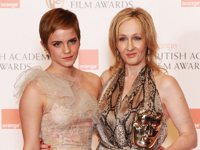 emmastonejk poses with the XXXXX award during the Orange British Academy Film Awards at The Royal Oper