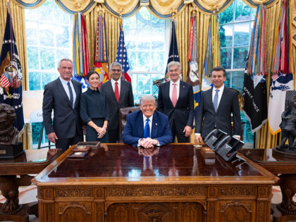 US President Donald Trump poses with HHS Secretary Robert F. Kennedy Jr., his daughter, Ki