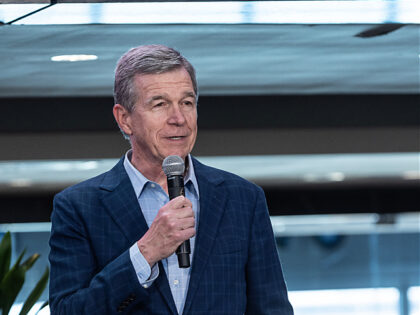 CHARLOTTE, NORTH CAROLINA - OCTOBER 26: North Carolina governor Roy Cooper speaks during a