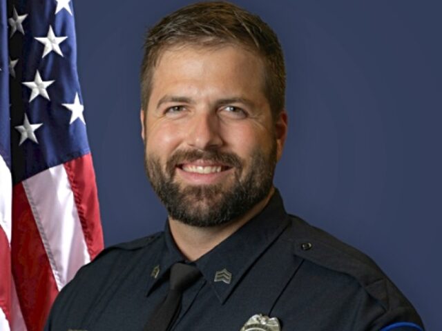 Hays, Kansas, police officer -- Sgt. Scott Heimann -- was shot and fatally wounded over th