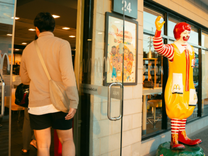 Back View of Man Entering McDonalds