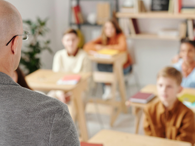 pexels-max-fischer-5212332 teacher students classroom