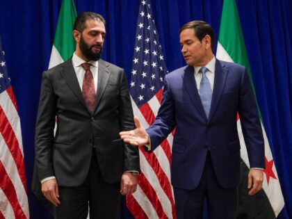 US Secretary of State Marco Rubio (R) meets with Syrian President Ahmed al-Sharaa at the L