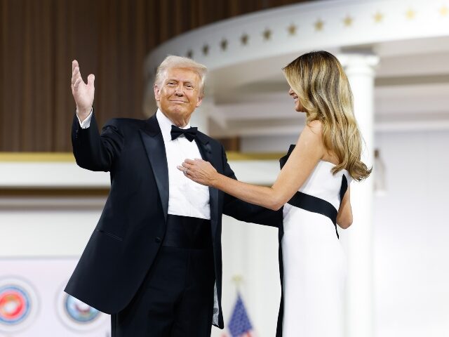 WASHINGTON, DC - JANUARY 20: President Donald Trump dances with wife Melania at the Comman