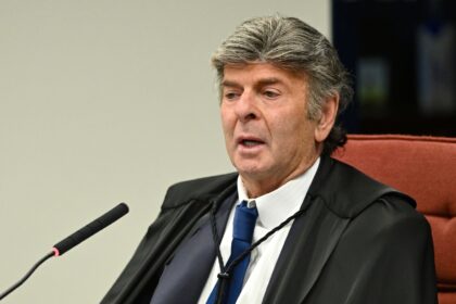 Brazilian Supreme Court justice Luiz Fux speaks during the voting session to convict or ac