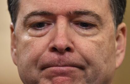 FBI Director James Comey looks on during the House Permanent Select Committee on Intellige