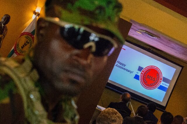 A Kenyan police officer looks on during an event marking the one year anniversary of the a