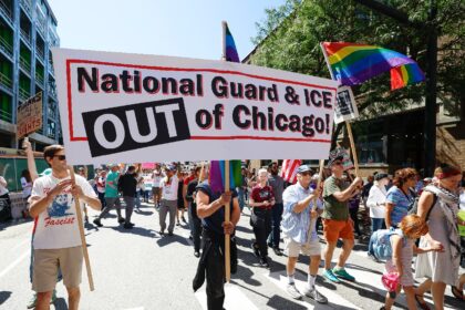 Protesters opposed to federal troop deployments in Chicago march in the city
