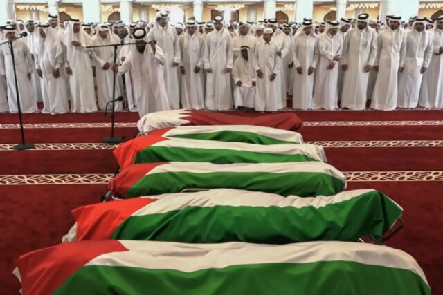 Qatar's emir joins mourners at the funeral of five Hamas members and a Qatari securit
