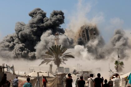 Smoke billows from Israeli strikes that brought down a high-rise tower in Gaza City on Fri