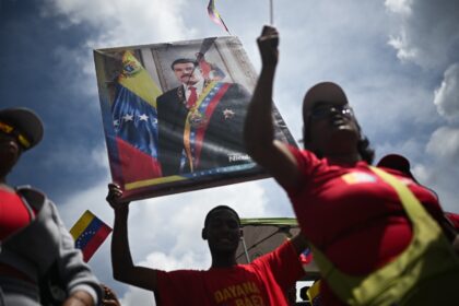Thousands of Venezuelans have joined a civilian militia in response to President Nicolas M
