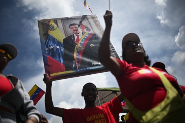 Thousands of Venezuelans have joined a civilian militia in response to President Nicolas M