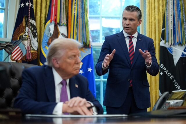 US President Donald Trump and Defense Secretary Pete Hegseth (R) address a rare gathering