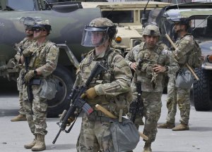 Trump vows to send troops to Chicago 'hellhole' but doesn't say when