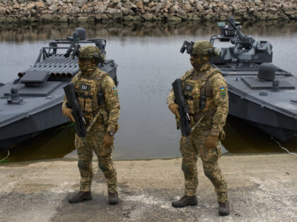 Ukraine's Security Service officers stand by Sea Baby drones, during a demonstration