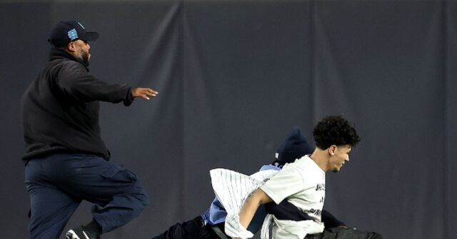 WATCH: Security Flattens Two Streakers During Yanks-Jays Playoff Game