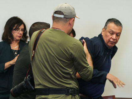 US Senator Alex Padilla, Democrat from California, is removed from the room after interrup