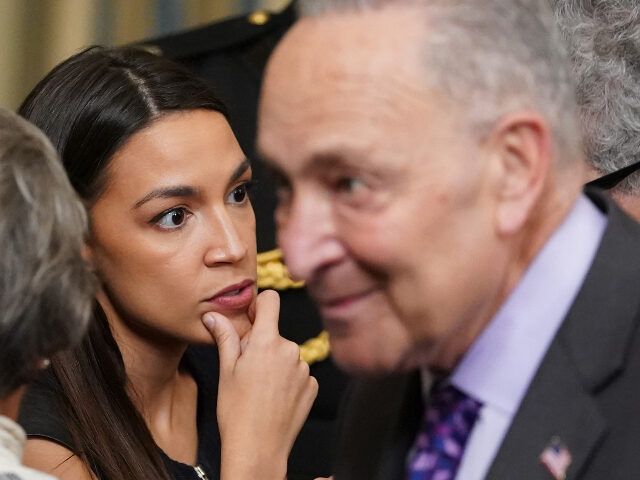 Alexandria Ocasio-Cortez and Chuck Schumer US Rep. Alexandria Ocasio-Cortez (C), D-NY, and Senate Majority Leader Chuck Schumer (R),