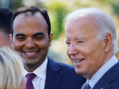 US President Joe Biden and Rohit Chopra, director of the Consumer Financial Protection Bur