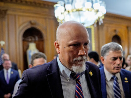 Rep. Chip Roy (R-TX) (C) and Rep. Andrew Clyde (R-GA) (R) depart after speaking to reporte