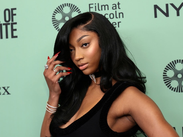 Angel Reese Trades Sneakers for Wings in Victoria's Secret Runway Shoot