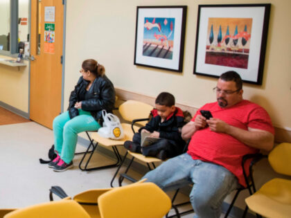 Patients wait in the waiting room at the Esperanza Health Center in Philadelphia, PA, on M