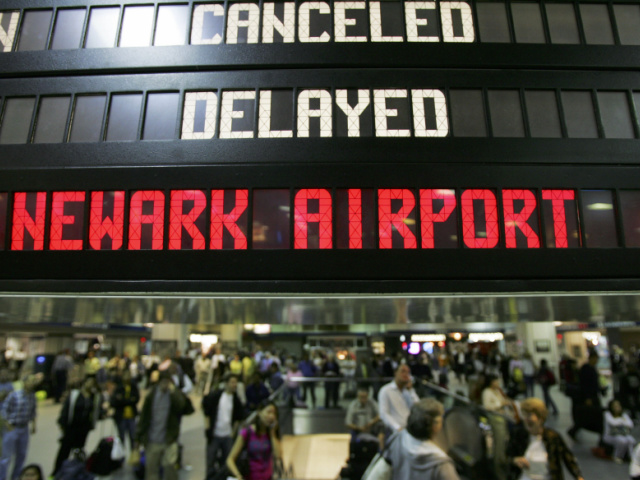 People wait for trains at Penn Station May 25, 2006 in New York City. A power outage halte