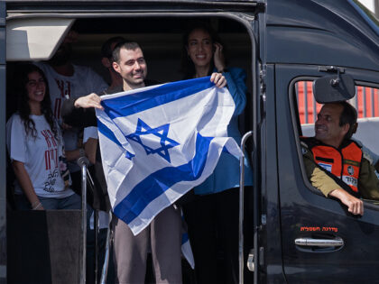 PETAH TIKVA, ISRAEL - OCTOBER 13: Former hostage Guy Gilboa-Dalal waves to supporters outs