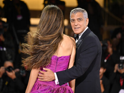 VENICE, ITALY - AUGUST 28: Amal Clooney and George Clooney attend the "Jay Kelly"