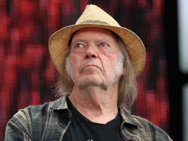 GettyImages-1176615537 Neil Young attends a press conference for Farm Aid 34 at Alpine Valley Music Theatre on Se