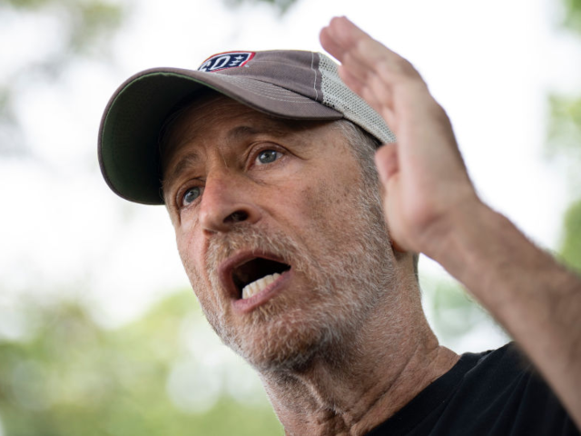 GettyImages-1242162768 WASHINGTON, DC - JULY 28: Jon Stewart speaks to the press before a news conference about t
