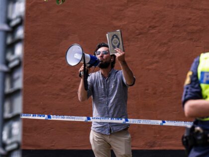 Salwan Momika protests outside a mosque in Stockholm on June 28, 2023, during the Eid al-A
