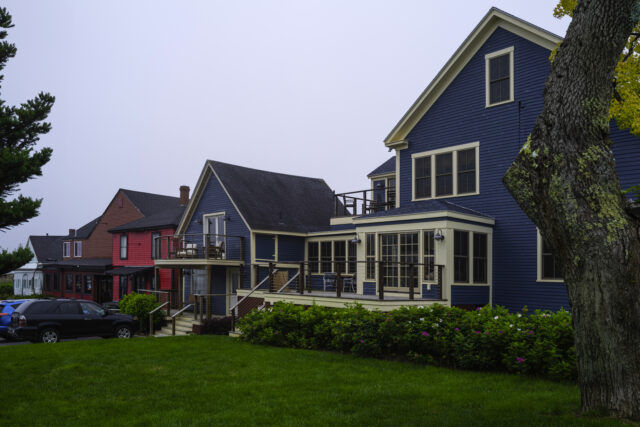 Vibrant buildings and garden in a small town shopping mall in the coastal village of New E