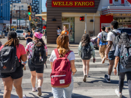 AUSTIN, TEXAS - FEBRUARY 22: Students exit campus at the University of Texas at Austin on
