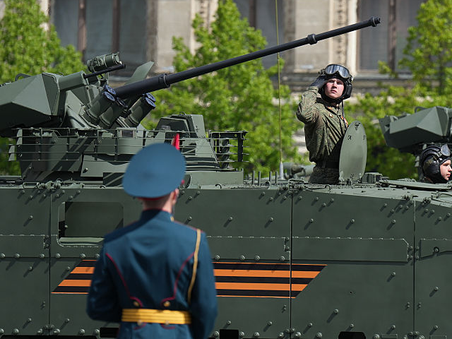 MOSCOW, RUSSIA - MAY 09: Russian tanks roll on Red Square during the Victory Day military