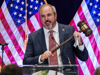 Florida state senator and newly elected RNC Chairman, Joe Gruters (R), holds a gavel as he