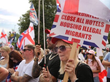 NORWICH, ENGLAND - AUGUST 24: Protesters against the asylum hotel, rally in the car park o