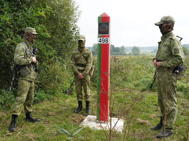 POLAND-EU-DIPLOMACY Belarusian border guard are pictured before Polish Prime Minister Donald Tusk and Preside